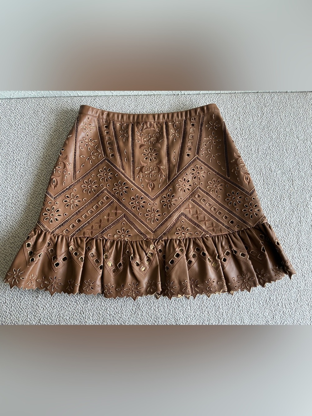 Christy Lynn Ashley Skirt S
Camel Vegan Leather Laser Cut
Floral Ruffle. - Picture 3 of 15